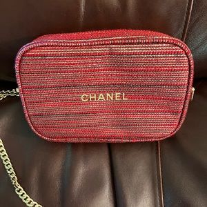 NWOT Chanel crossbody bag.  Pretty red and gold fabric with gold chain.